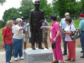 admiring statue