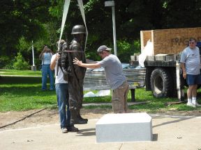 placing the statue